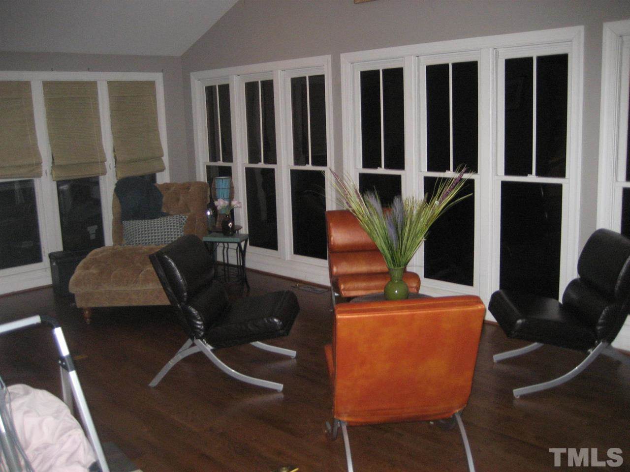 309 Avon Drive Raleigh, NC 27608 - Photo 11 of 17 a view of a dining room with furniture