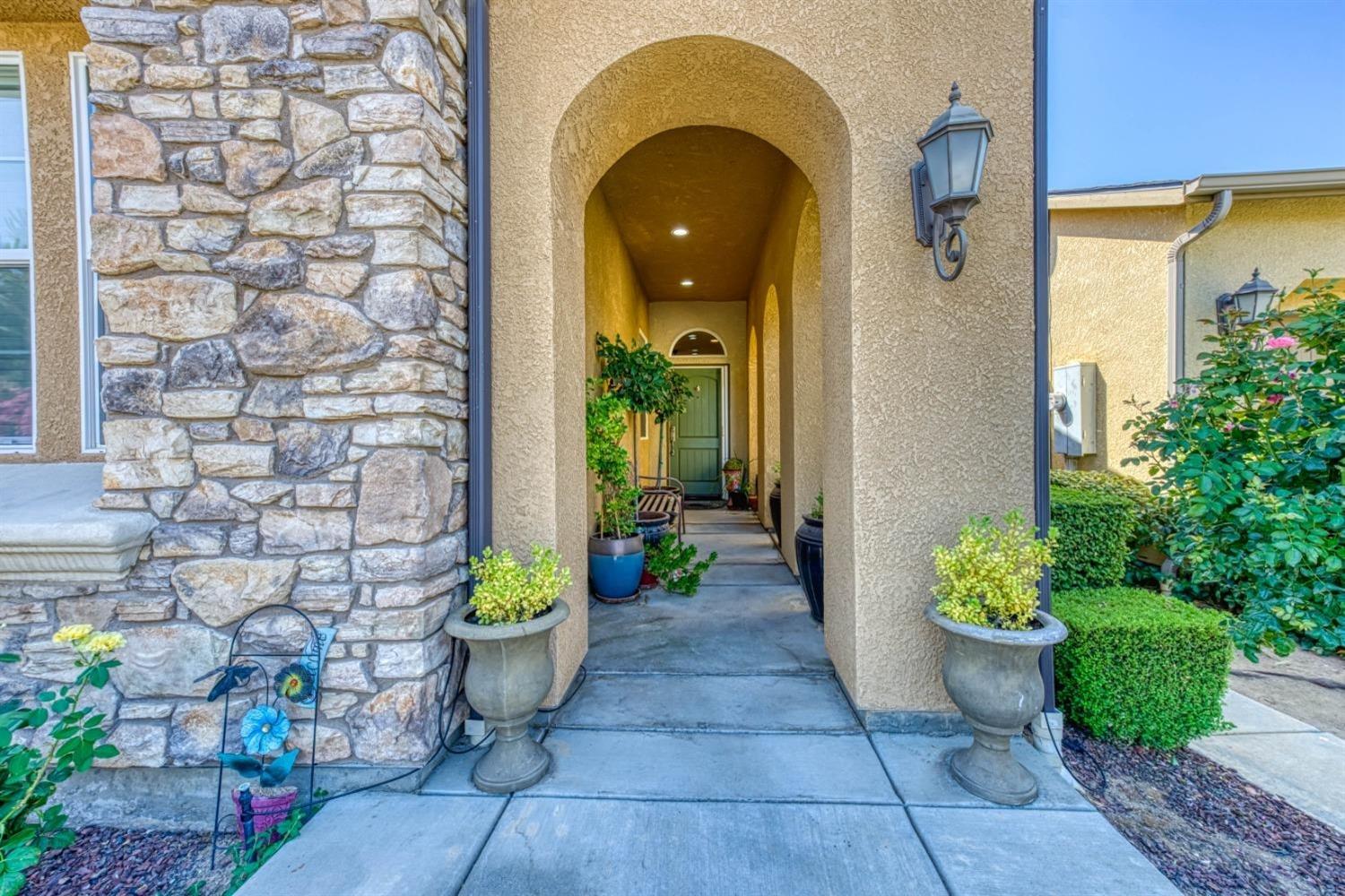 3754 Salem Lane Clovis, CA 93619 - Photo 2 of 18 a view of a entryway door front of house