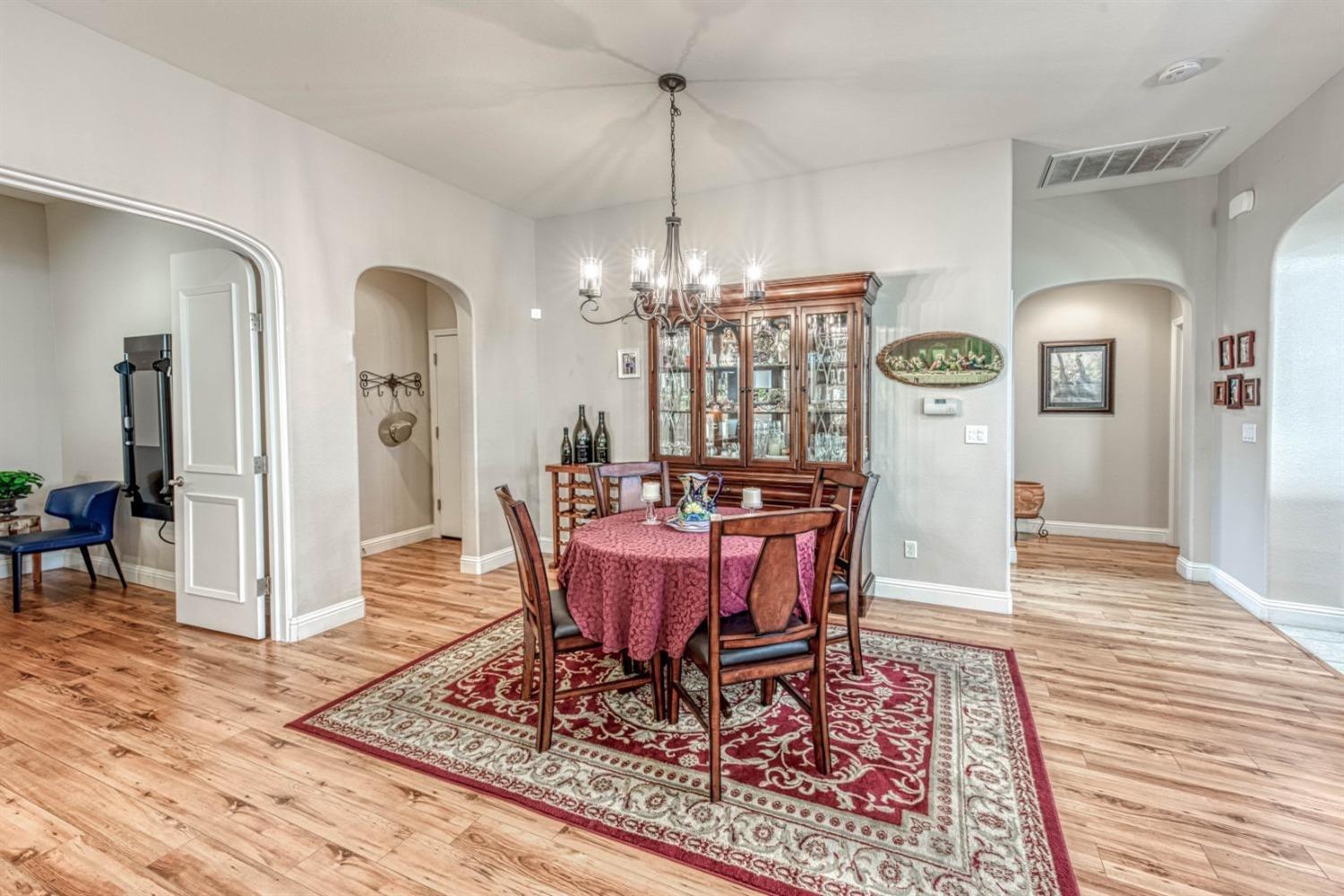 3754 Salem Lane Clovis, CA 93619 - Photo 5 of 18 a view of a dining room with furniture