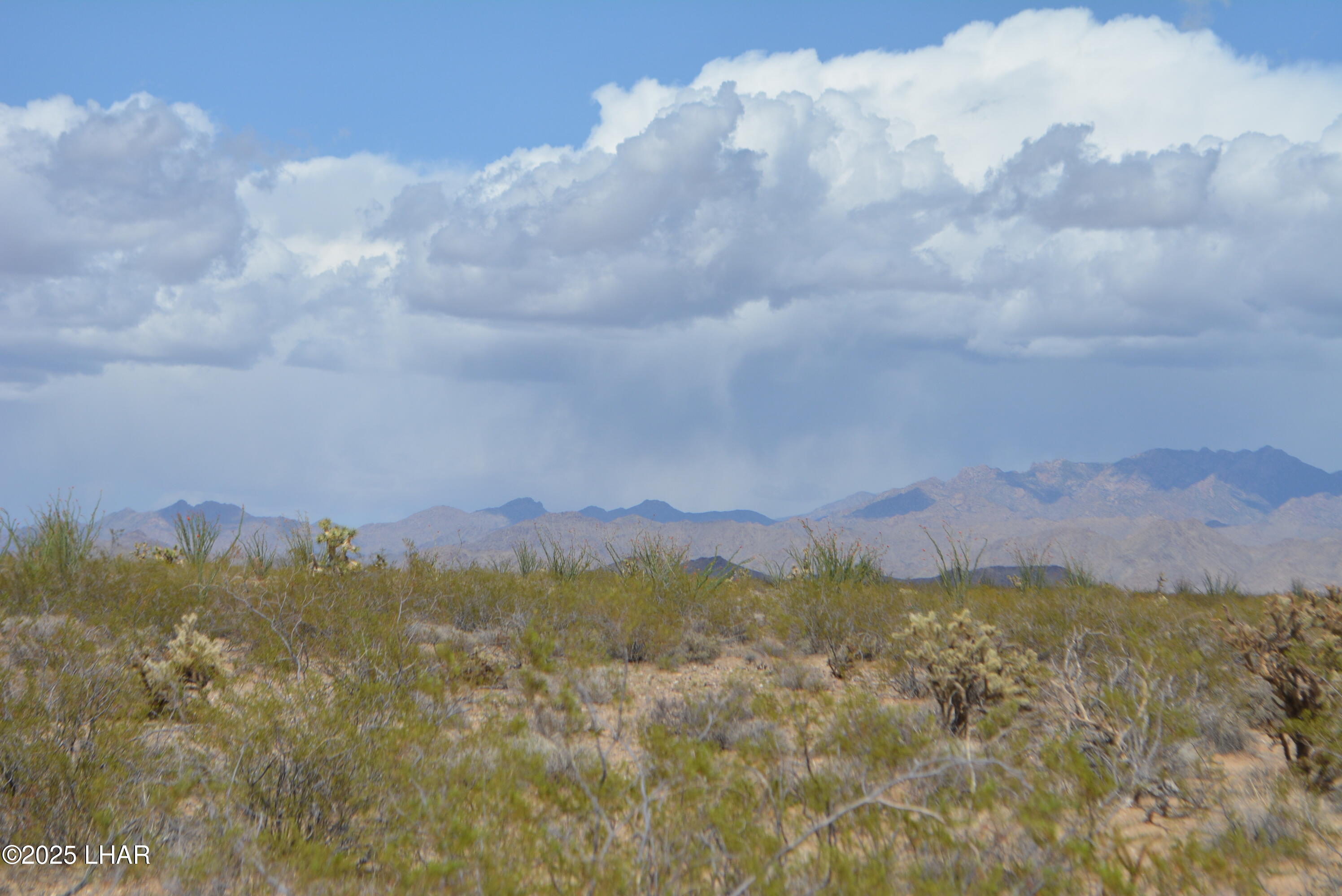 165-166 Cherry Road Yucca, AZ 86438 - Photo 54 of 95 a view of a city and mountain
