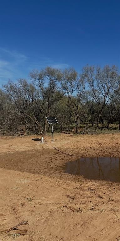 129 Rule Tx 79547 Rule, TX 79547 - Photo 14 of 17 a view of dirt field with large trees