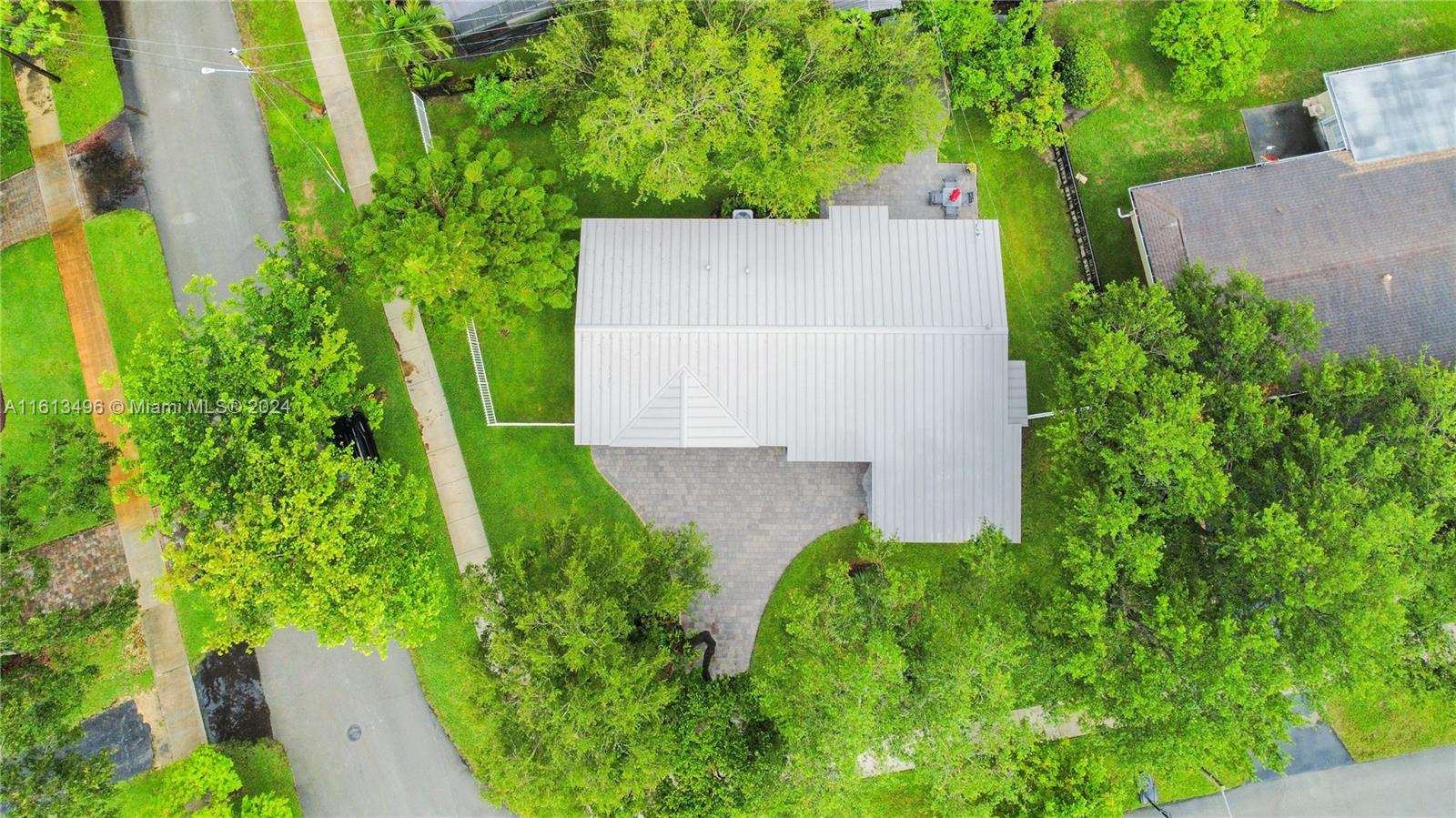 9730 Southwest 76th Street Miami, FL 33173 - Photo 25 of 27 an aerial view of a house