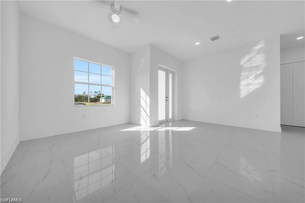 3310 11th Street West Lehigh Acres, FL 33971 - Photo 20 of 20 an empty room with windows