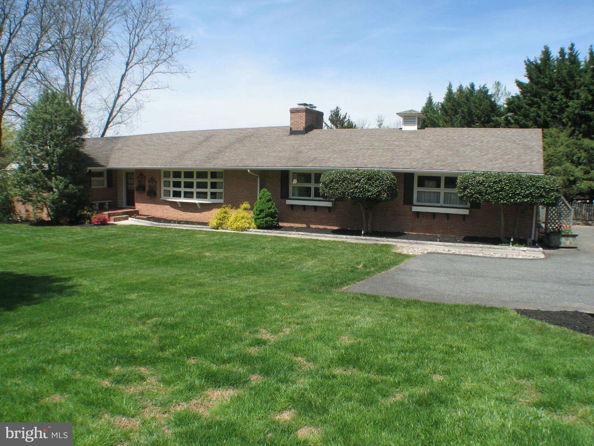 1200 Doves Cove Road Baltimore, MD 21286 - Photo 1 of 25 a view of a house with a yard