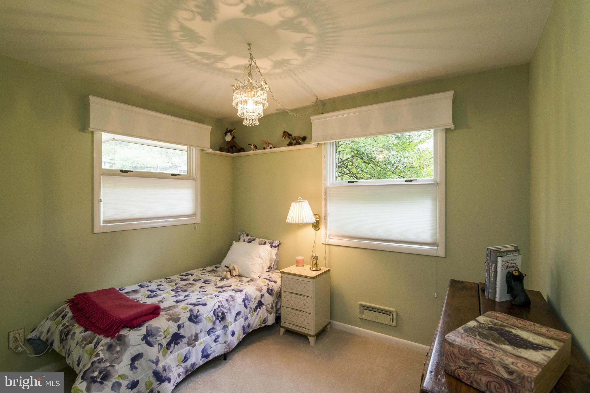 1200 Doves Cove Road Baltimore, MD 21286 - Photo 16 of 25 a bedroom with a bed and a window