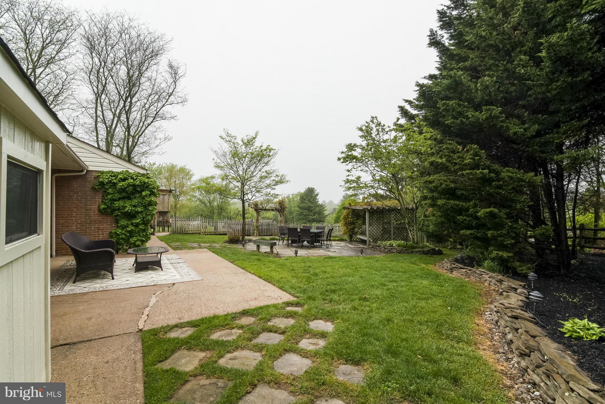 1200 Doves Cove Road Baltimore, MD 21286 - Photo 22 of 25 a view of a backyard with sitting area