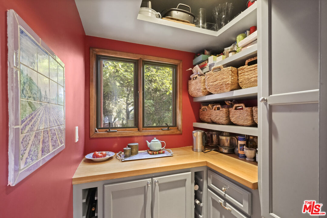 809 Basin Drive Topanga, CA 90290 - Photo 14 of 57 a utility room with dryer and washer