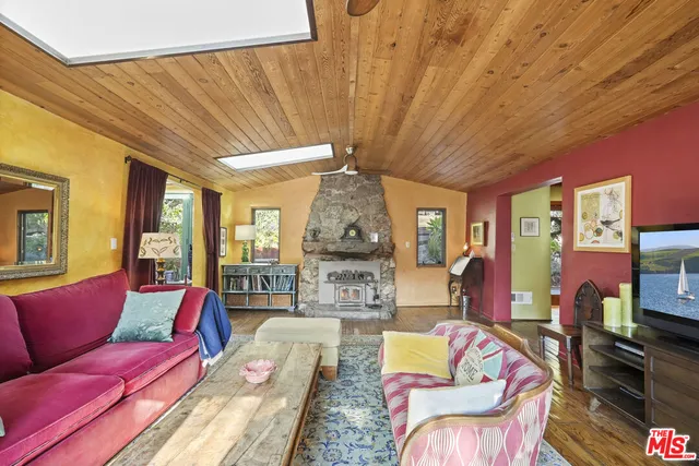 a view of a balcony with furniture