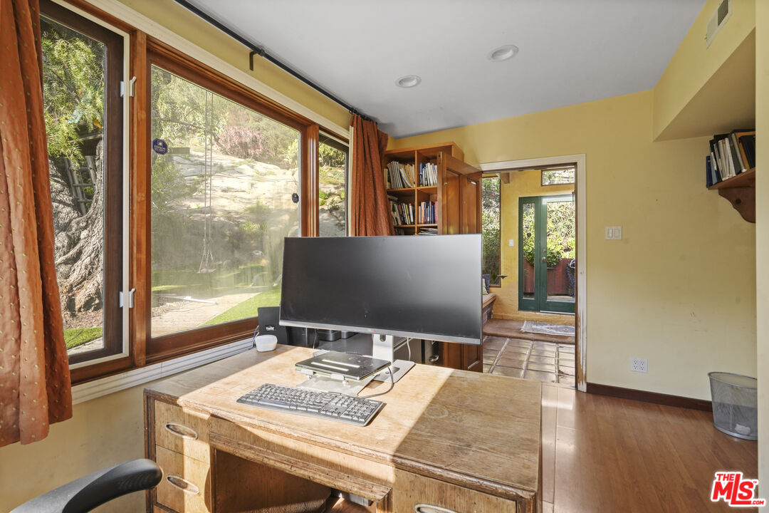 809 Basin Drive Topanga, CA 90290 - Photo 57 of 57 a view of a dining room with furniture and wooden floor
