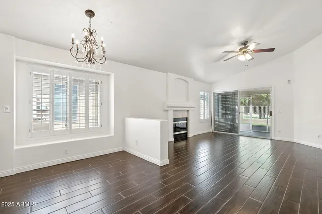 a kitchen with a table and chairs