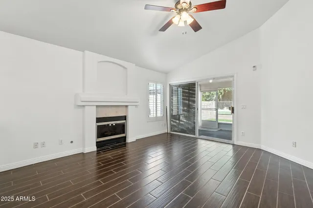 a kitchen with stainless steel appliances a white stove top oven cabinets a refrigerator and a stove