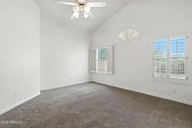 a view of kitchen with wooden floor and electronic appliances