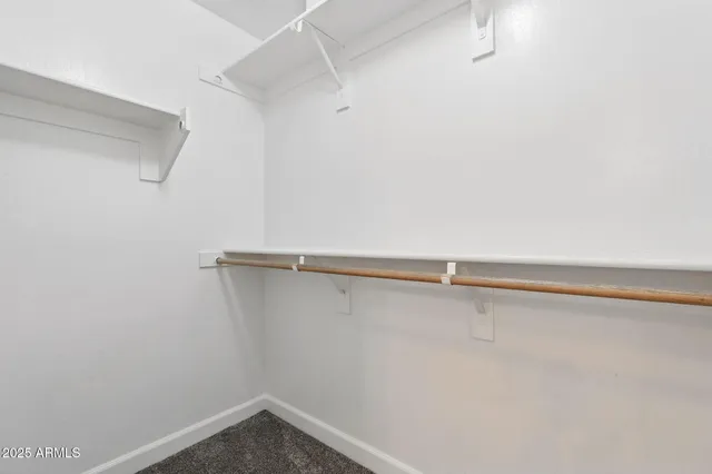 a bathroom with a bathtub shower sink double and mirror