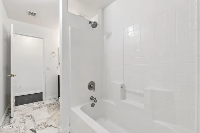 a bathroom with a bathtub