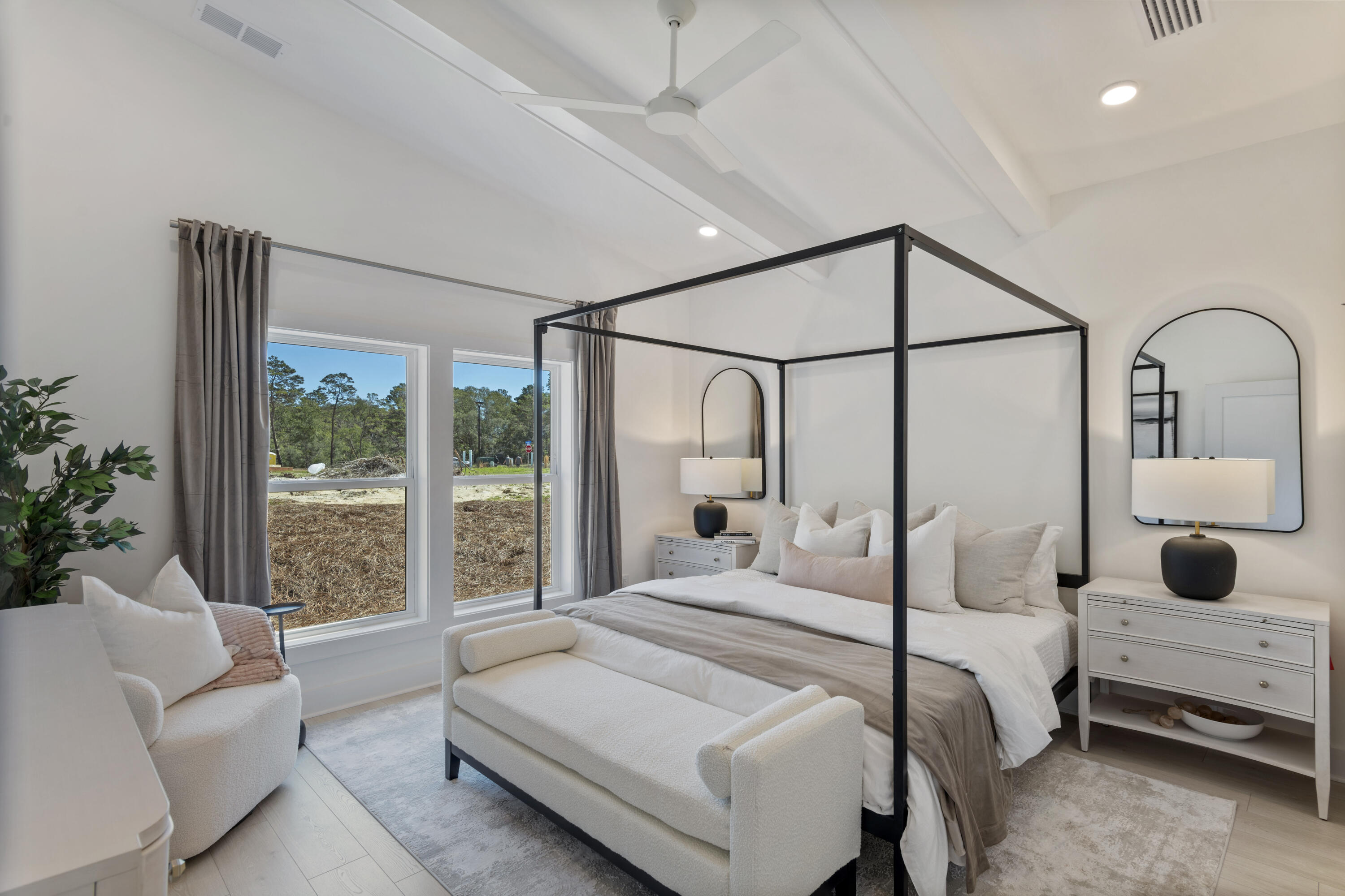 22 Asher St Inlet Beach, Unit LOT 35 Inlet Beach, FL 32461 - Photo 17 of 43 a bedroom with a large bed and a window