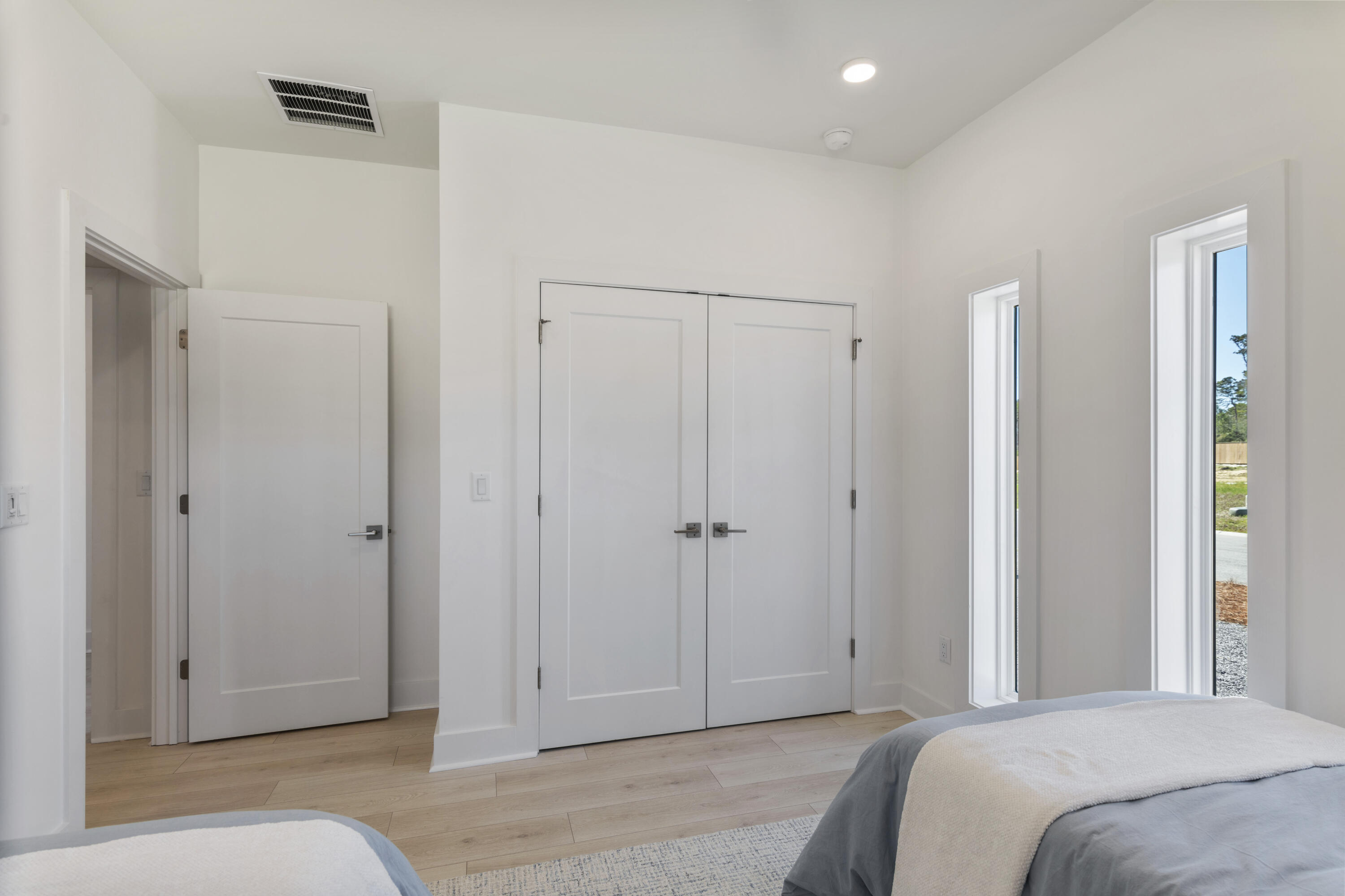 22 Asher St Inlet Beach, Unit LOT 35 Inlet Beach, FL 32461 - Photo 28 of 43 a bedroom with a bed and a shower
