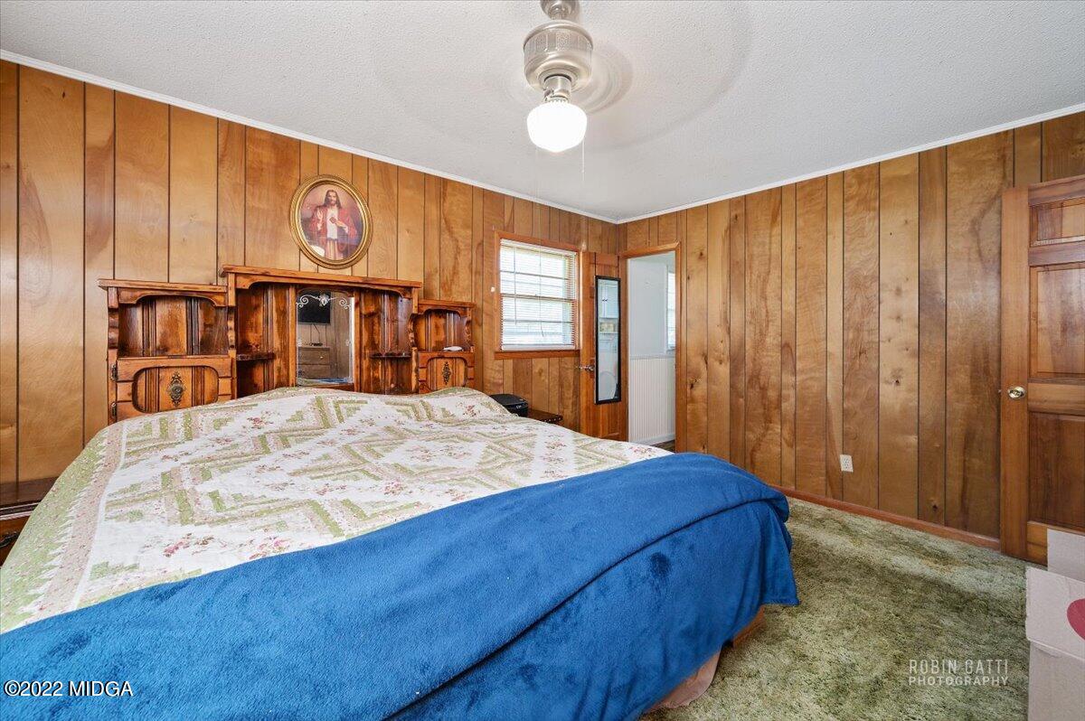 1979 Bonner Gilbert Road Macon, GA 31220 - Photo 13 of 35 a bed sitting in a spacious bedroom next to a window