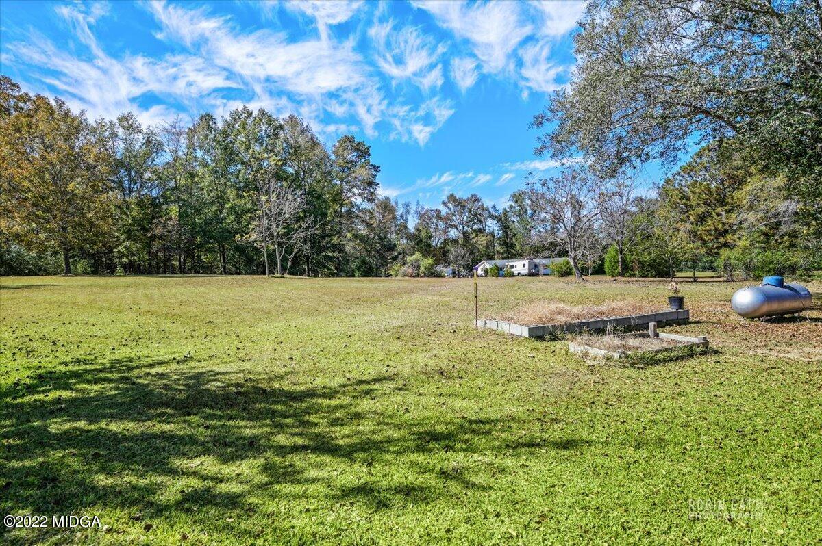 1979 Bonner Gilbert Road Macon, GA 31220 - Photo 24 of 35 a view of a lake with a yard