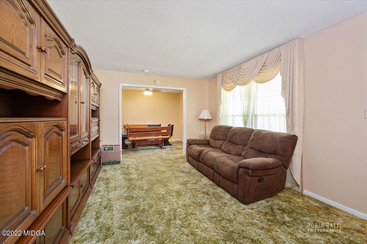 1979 Bonner Gilbert Road Macon, GA 31220 - Photo 10 of 35 a living room with furniture and a large window