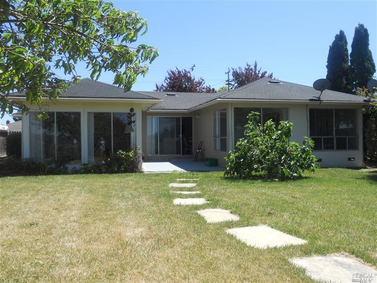 217 Montego Key Novato, CA 94949 - Photo 1 of 1 a front view of a house with a yard