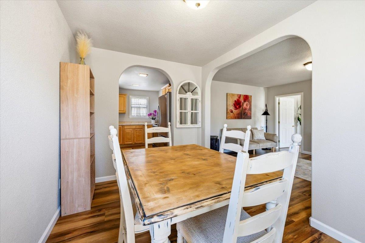 232 Upper Slate Creek Road Grass Valley, CA 95945 - Photo 8 of 48 a view of a dining room with furniture