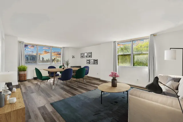 a living room with furniture or window and a wooden floor