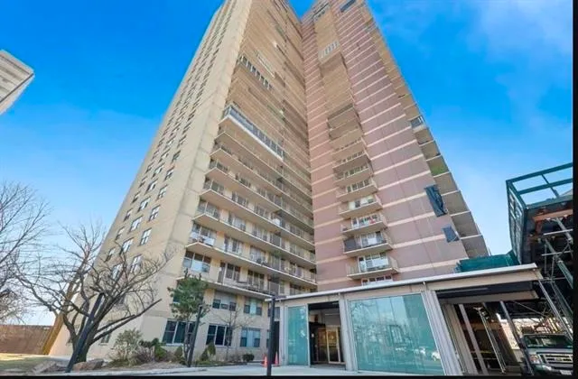 a view of a city with tall buildings