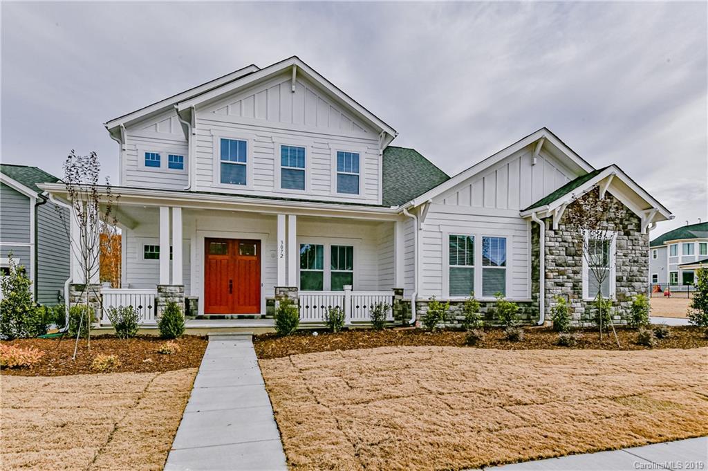 3072 Fish Story Court, Unit 360 Fort Mill, SC 29708 - Photo 4 of 27 a front view of a house with a yard