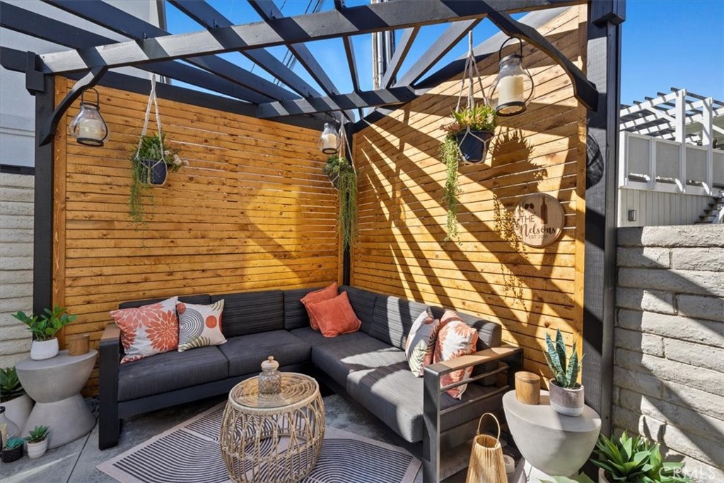 35 Geneva Walk Long Beach, CA 90803 - Photo 16 of 52 a outdoor living space with furniture and a ceiling fan