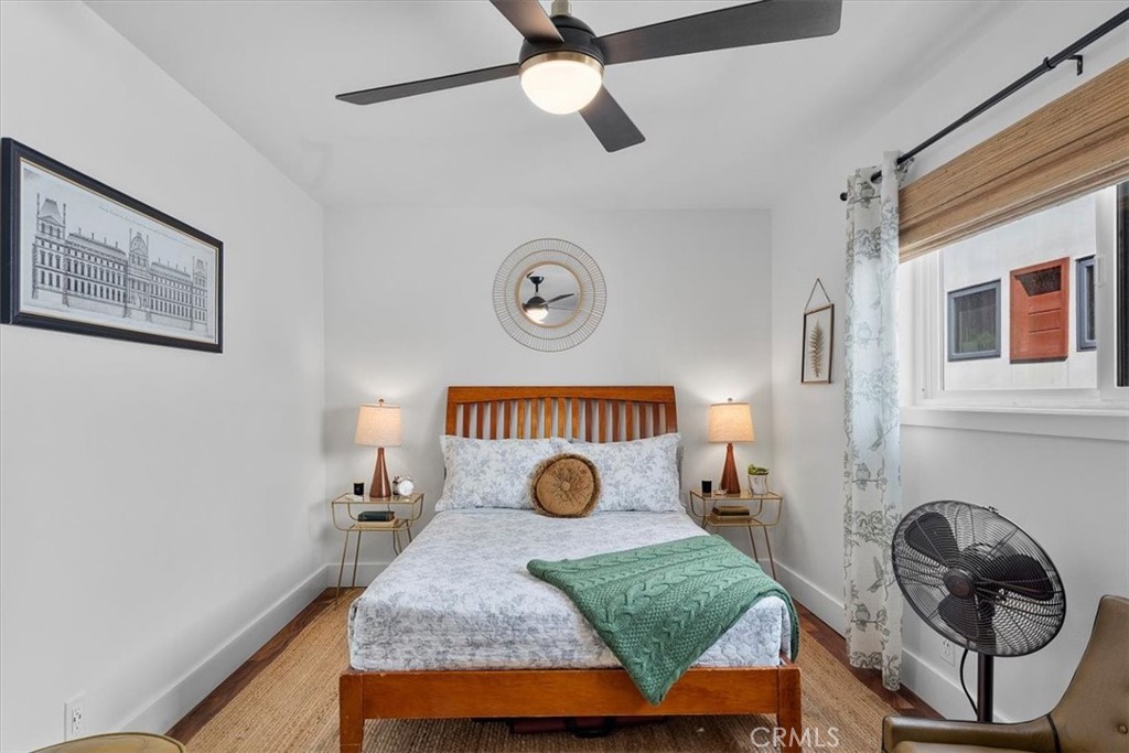 35 Geneva Walk Long Beach, CA 90803 - Photo 33 of 52 a bedroom with a bed and a window