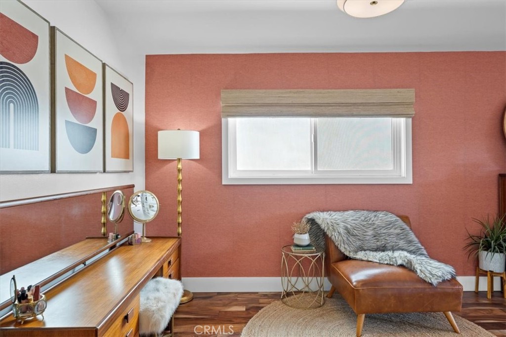 35 Geneva Walk Long Beach, CA 90803 - Photo 34 of 52 a room with furniture and wooden floor