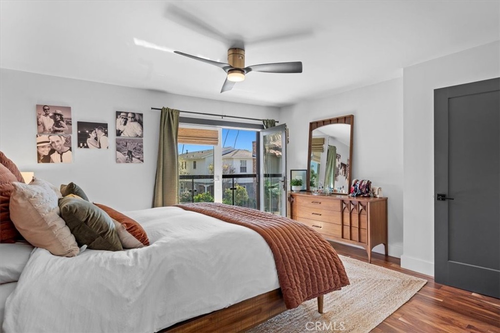 35 Geneva Walk Long Beach, CA 90803 - Photo 37 of 52 a bedroom with a large bed and a large window