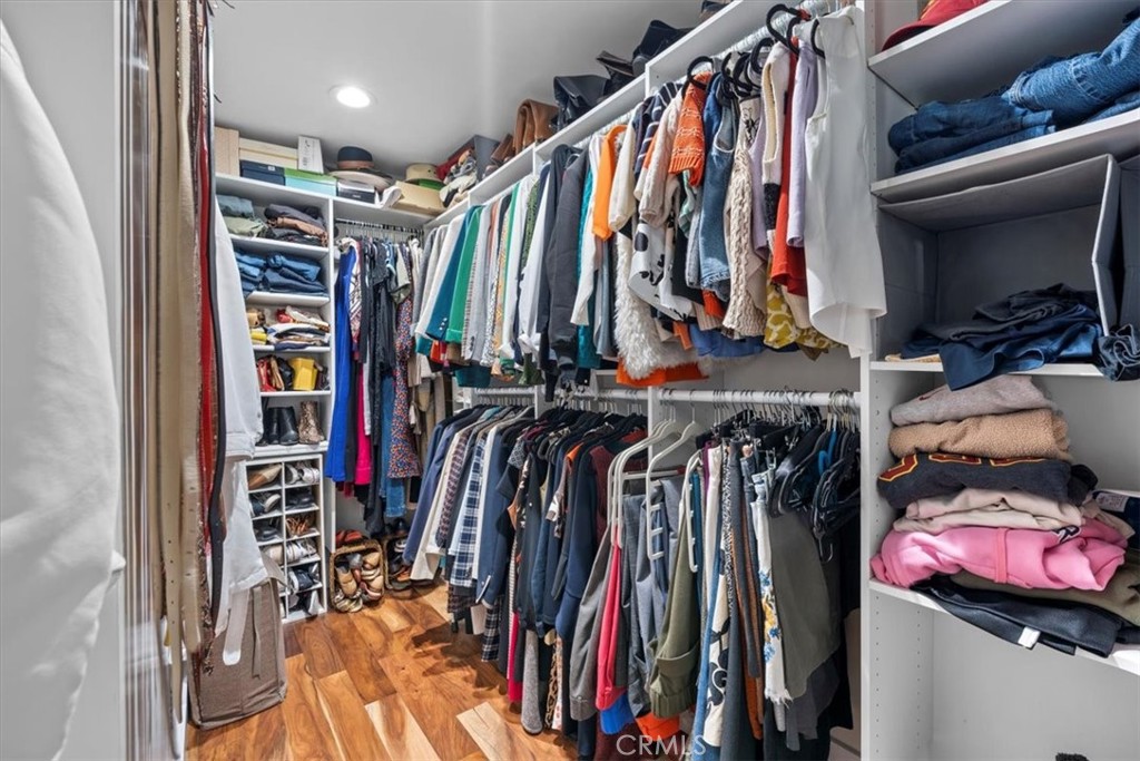 35 Geneva Walk Long Beach, CA 90803 - Photo 41 of 52 a view of walk in closet with clothes