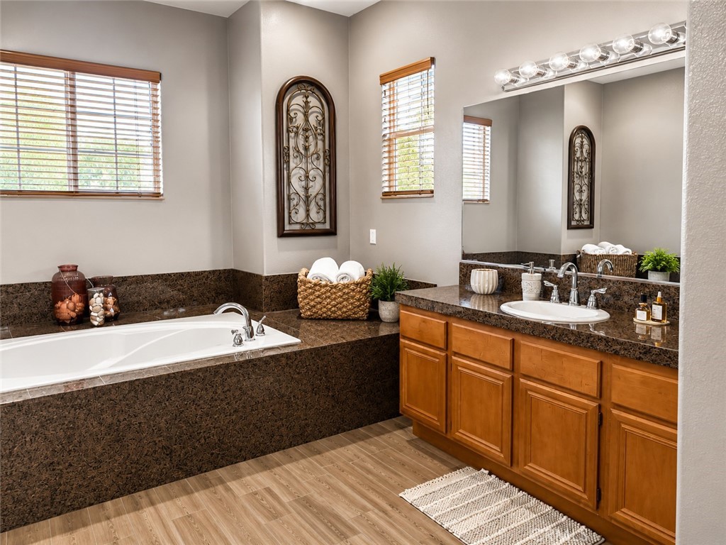 23841 Piedras Road Perris, CA 92570 - Photo 36 of 70 right side and tub master bedroom