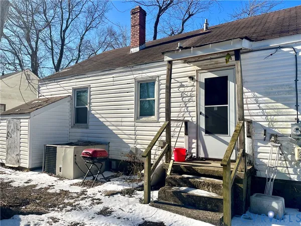 a view of a house with a patio