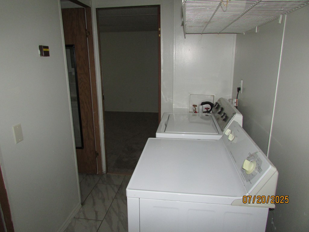 1444 Abe Cove Road Hiawassee, GA 30546 - Photo 11 of 25 a utility room with dryer and washer