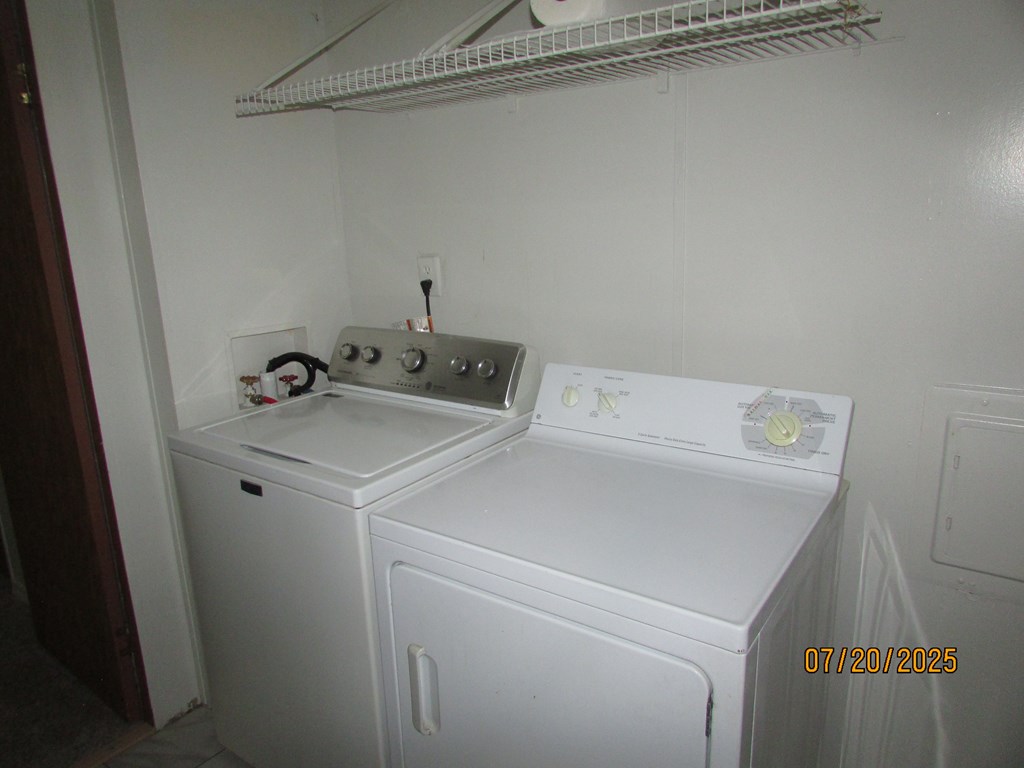 1444 Abe Cove Road Hiawassee, GA 30546 - Photo 13 of 25 a utility room with dryer and washer