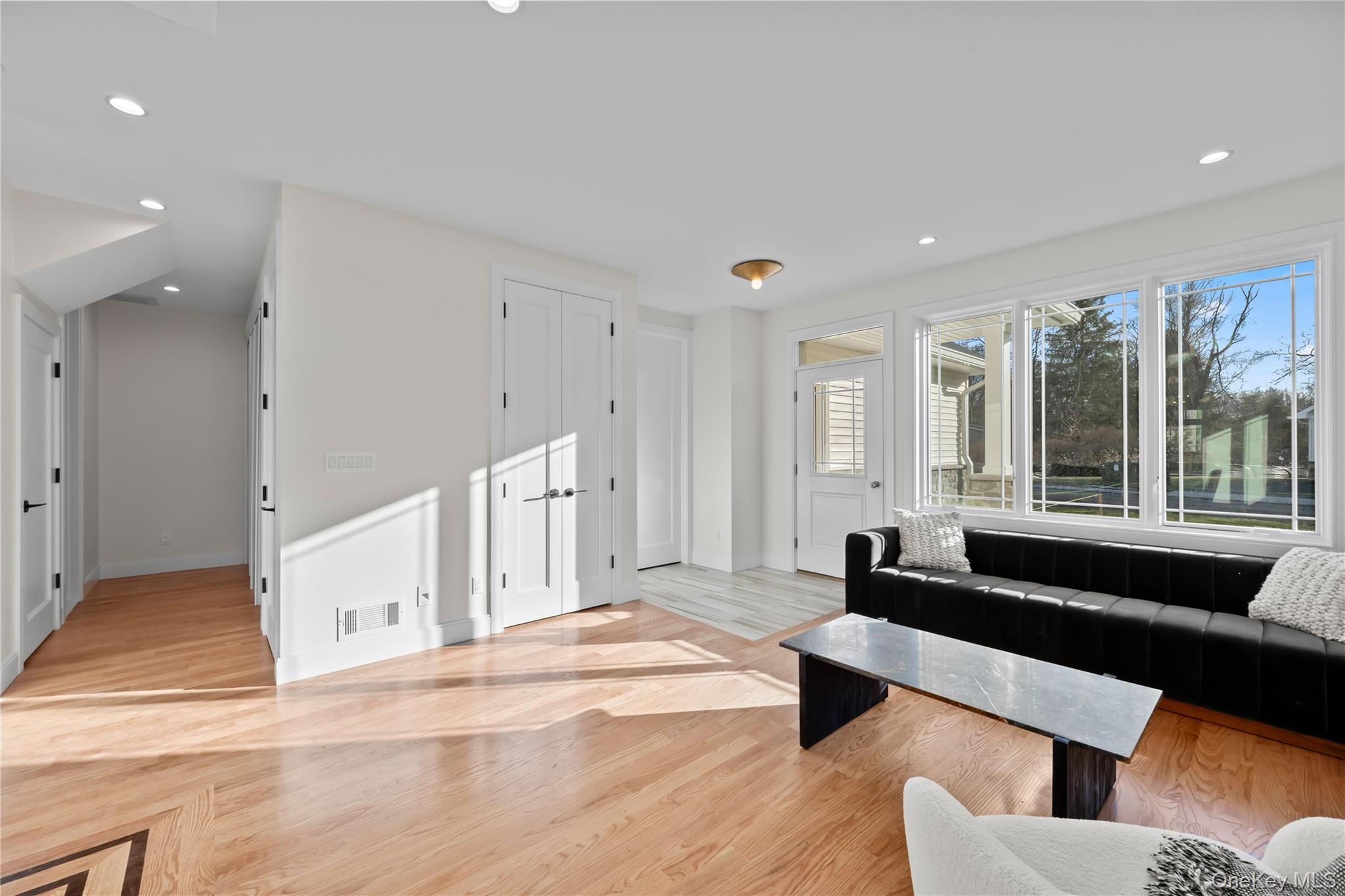59 Dessau Circle Spring Valley, NY 10977 - Photo 14 of 48 a living room with furniture and large windows