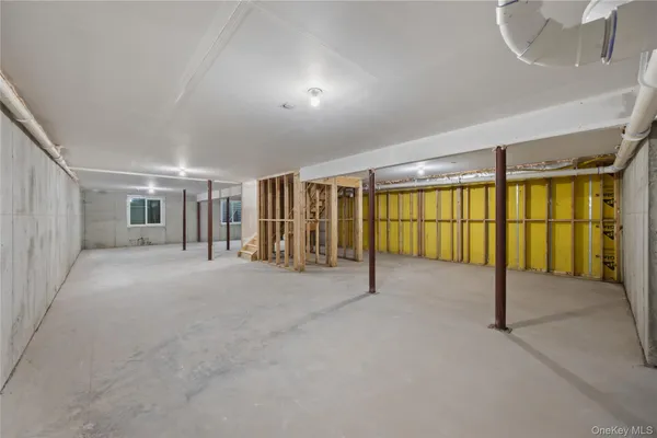 a view of livingroom with an empty room