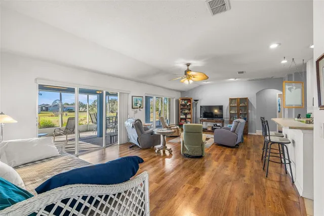 a kitchen with cabinets stainless steel appliances and a counter space