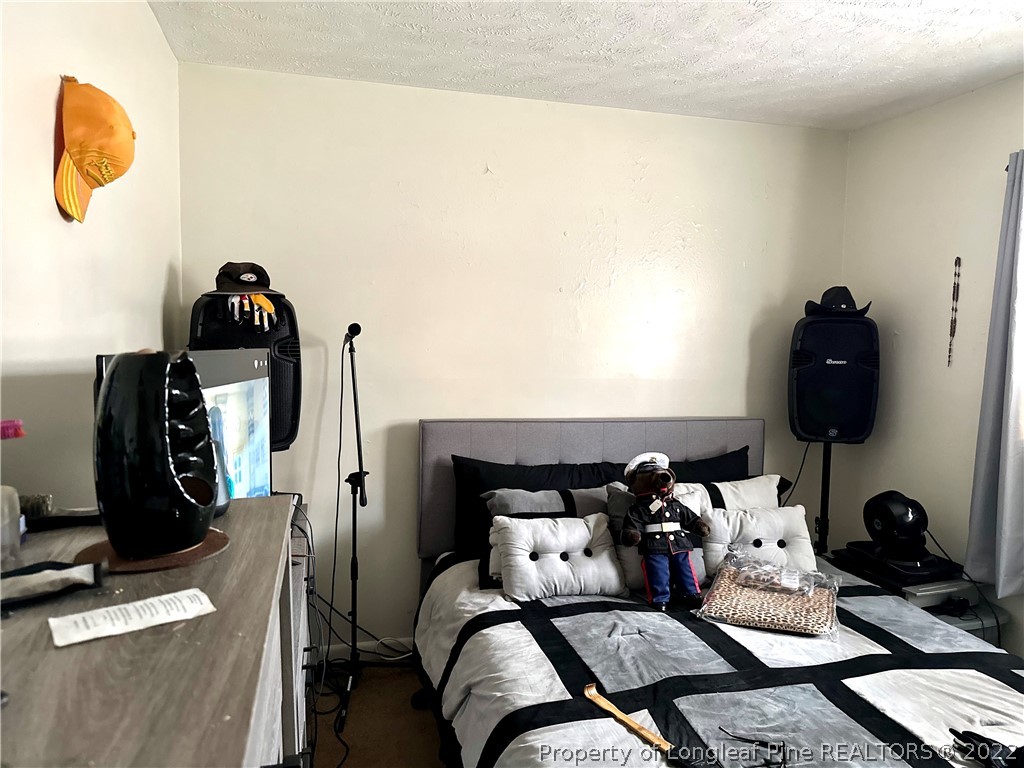 7405 Southgate Road Fayetteville, NC 28314 - Photo 15 of 16 a living room with furniture
