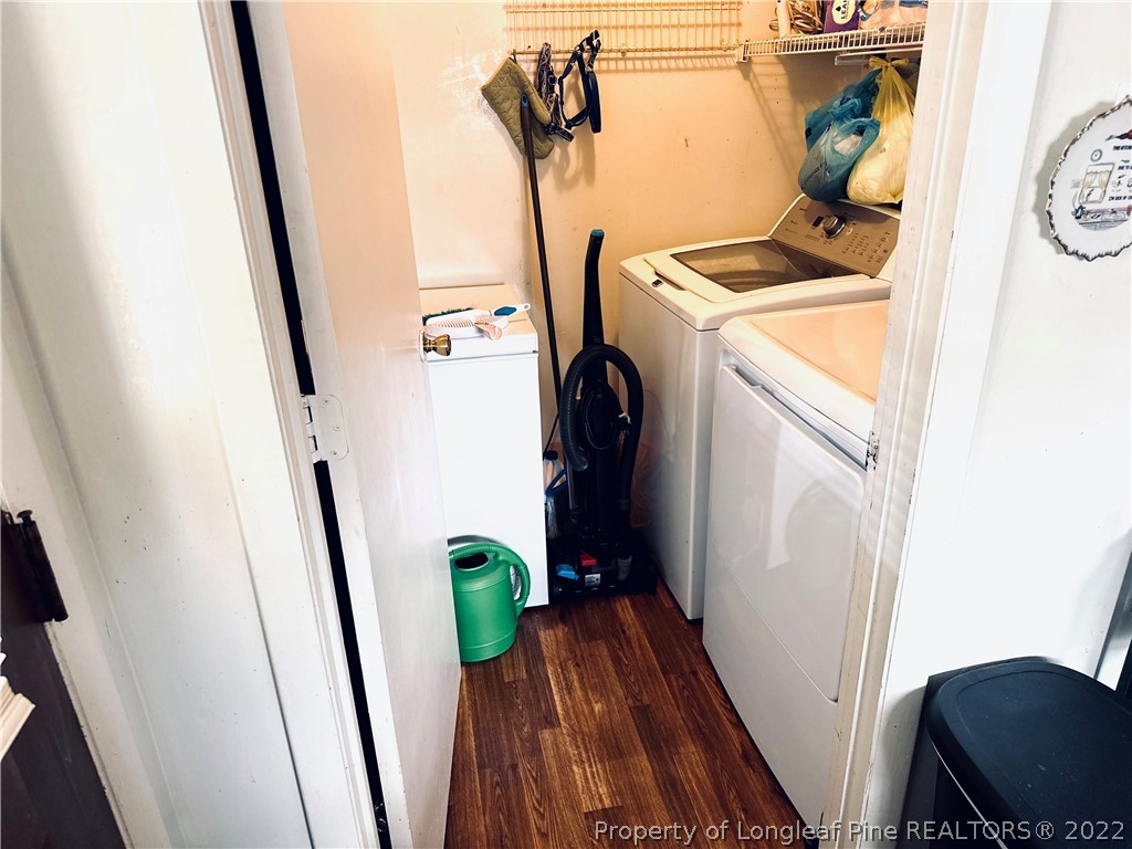 7405 Southgate Road Fayetteville, NC 28314 - Photo 5 of 16 a view of storage and utility room with wooden floor