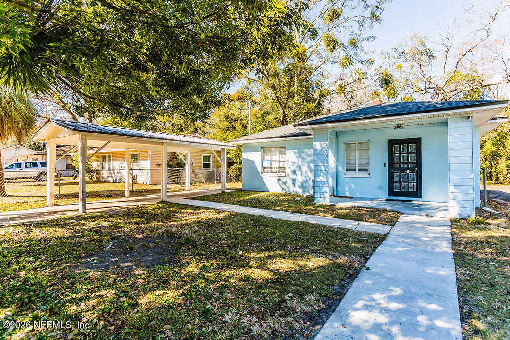2533 Orchard Street Jacksonville, FL 32254 - Photo 2 of 13 a view of a house with a backyard