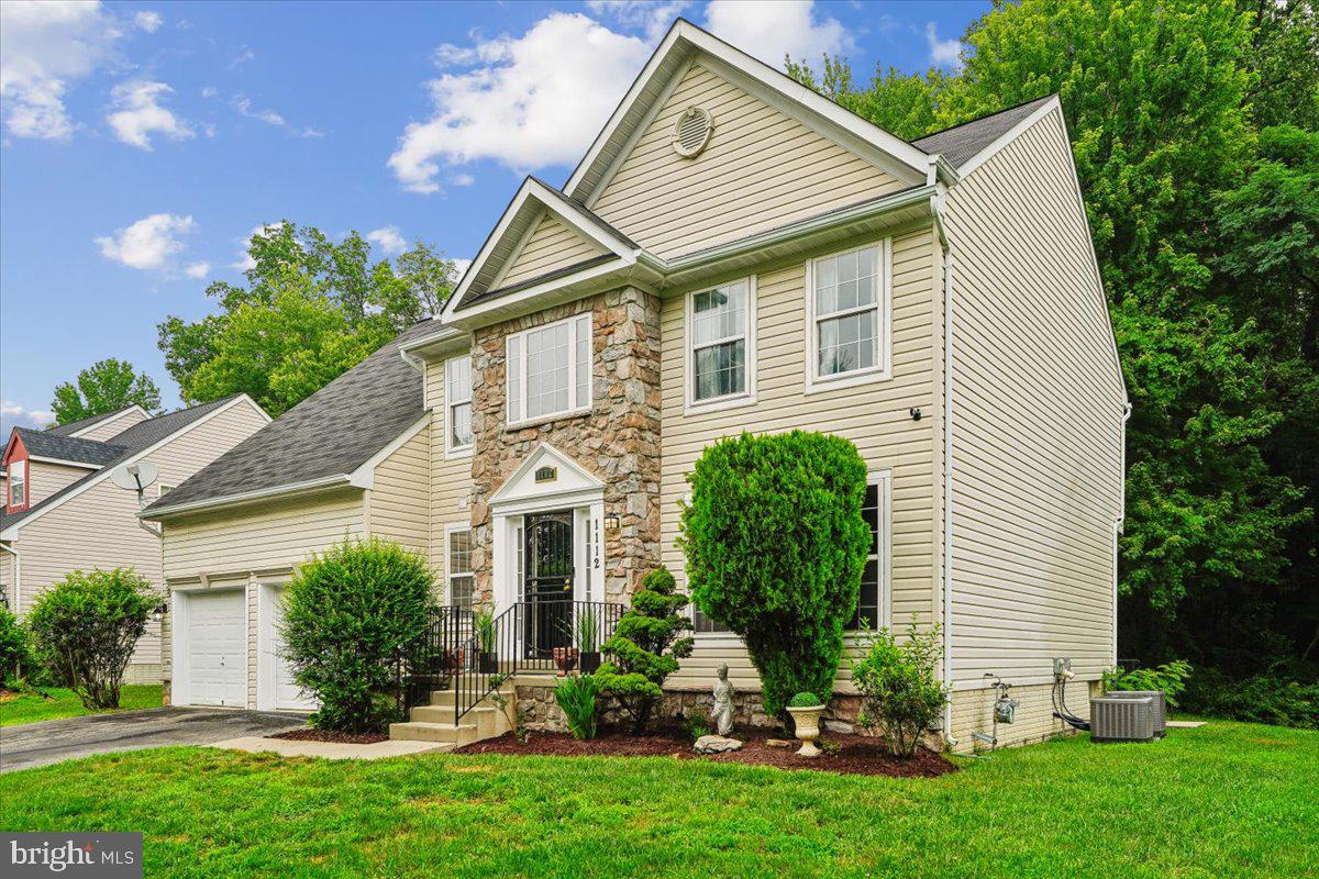 1112 Ryon Way District Heights, MD 20747 - Photo 2 of 63 a front view of house with yard