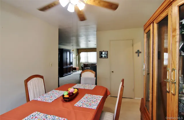 a bedroom with furniture and wooden floor