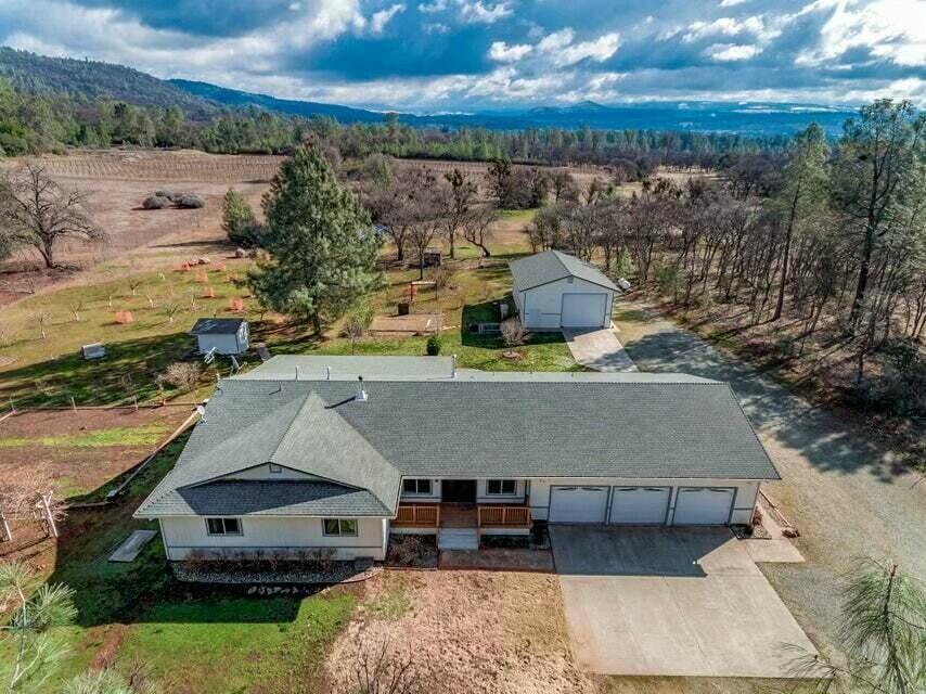 5747 Wilson Hill Road Manton, CA 96059 - Photo 1 of 31 an aerial view of a house with a garden