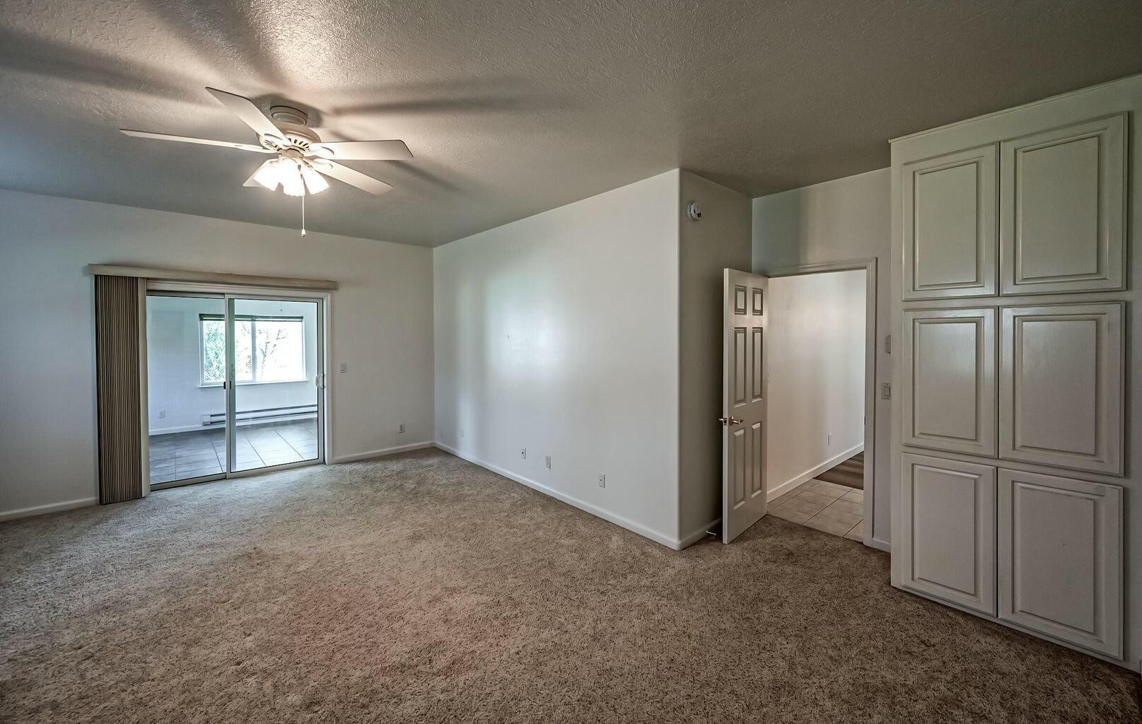 5747 Wilson Hill Road Manton, CA 96059 - Photo 12 of 31 an empty room with windows and closet
