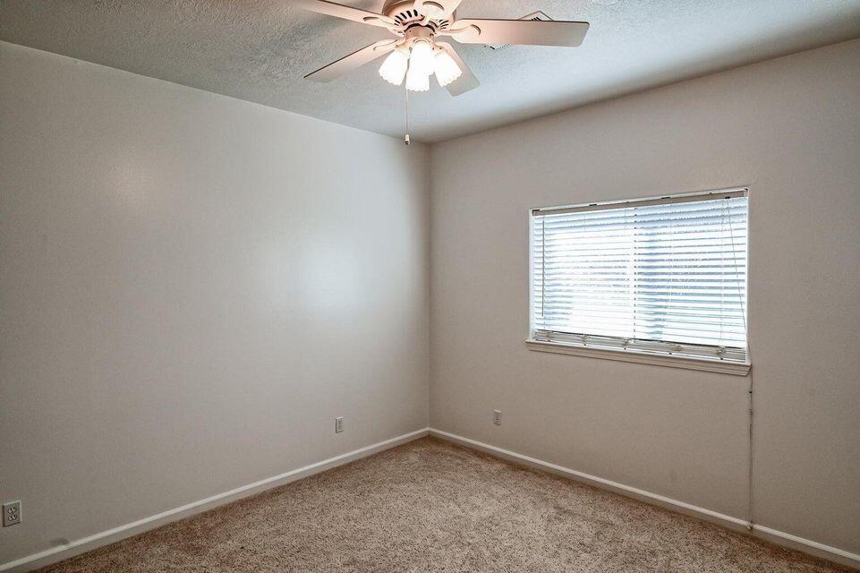 5747 Wilson Hill Road Manton, CA 96059 - Photo 15 of 31 an empty room with a window and a fan