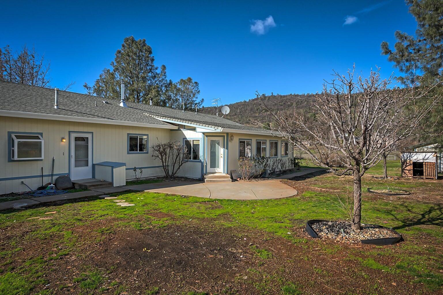 5747 Wilson Hill Road Manton, CA 96059 - Photo 24 of 31 a view of a yard with a house