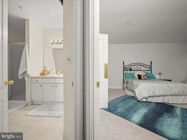 a bedroom with a bed and storage